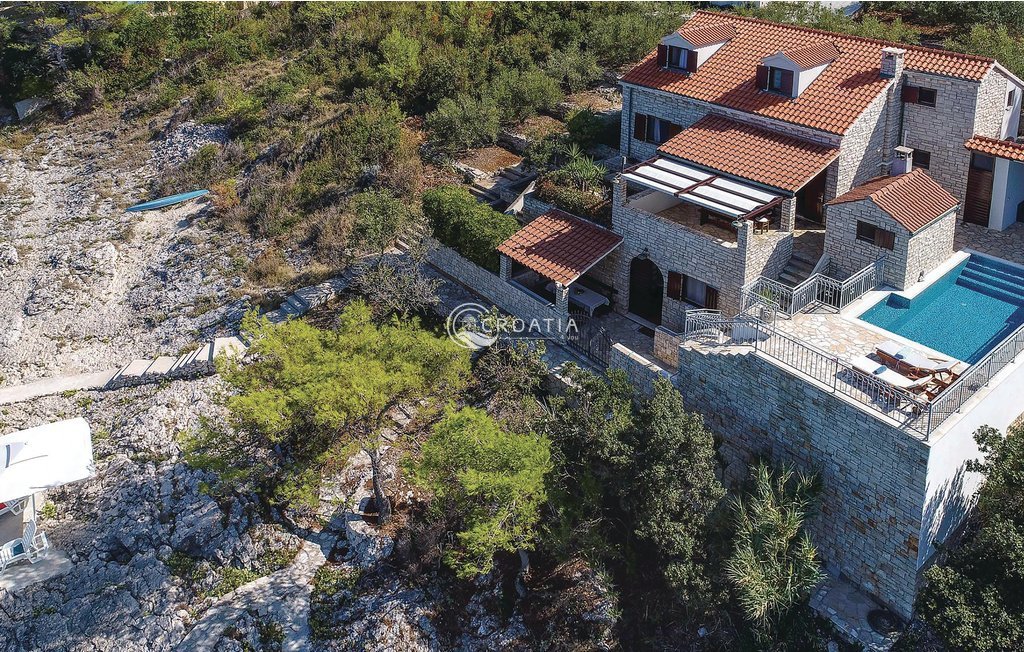 Stone holiday house with land on island Korcula