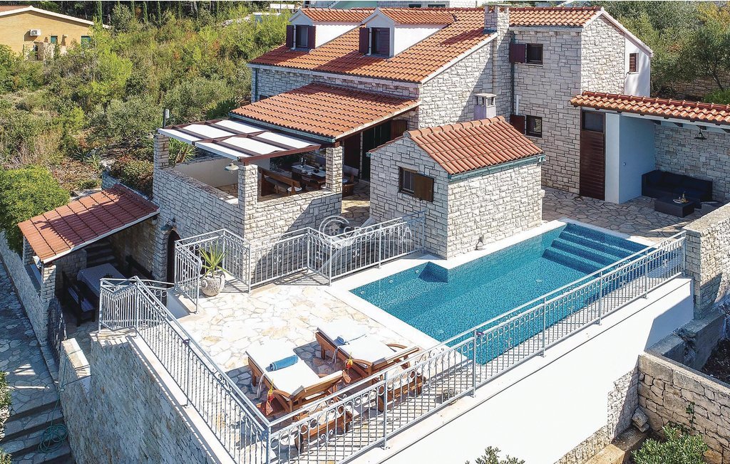 Stone holiday house with land on island Korcula