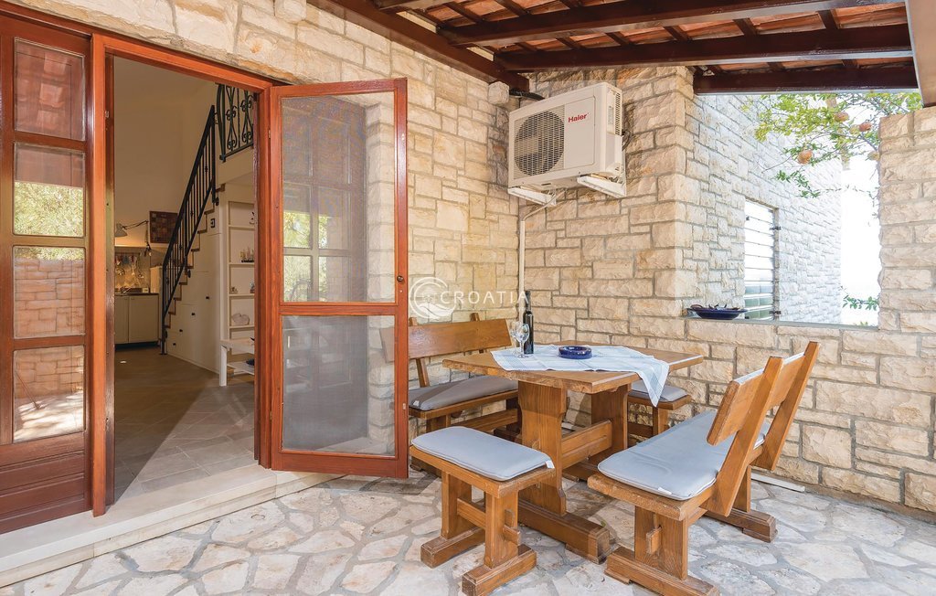 Stone holiday house with land on island Korcula