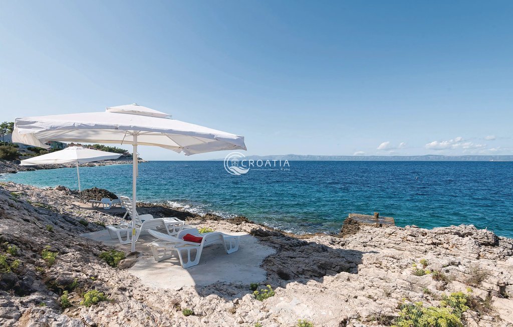 Stone holiday house with land on island Korcula