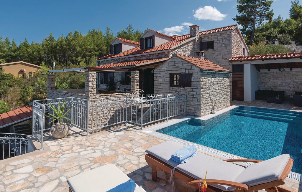 Stone holiday house with land on island Korcula